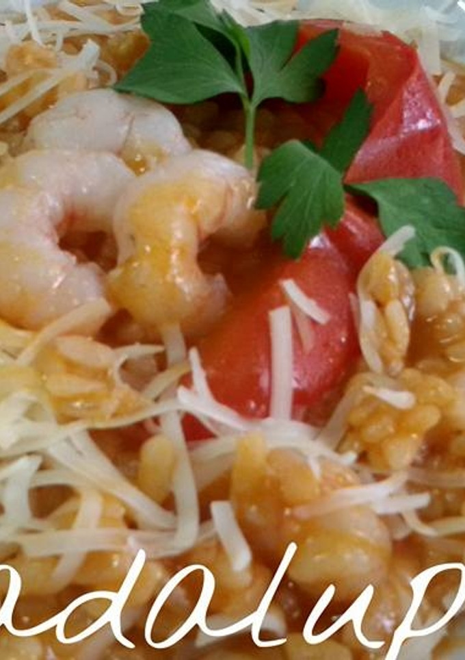 Una foto de Arroz meloso de tomate y gambas en GME y F y tradicional