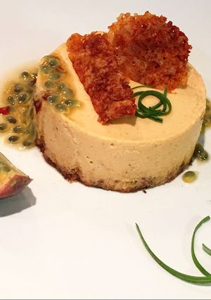A picture of Carrot and goat cheese mousse with hot passion fruit sauce.