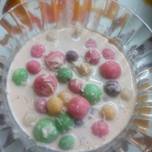 Colourful creamy drops in dry fruit milk