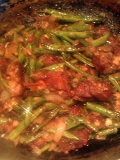 A picture of green beans with pork..