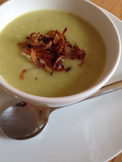 A picture of Leek and celery soup with spiced onions.