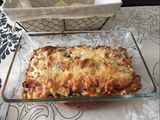Lasaña de berenjena rellena de carne y rulo de cabra con topping de bacon y 4 quesos