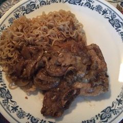 A picture of Pork Chops With Tarragon Onion Gravy.