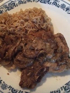 A picture of Pork Chops With Tarragon Onion Gravy.