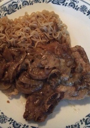 A picture of Pork Chops With Tarragon Onion Gravy.