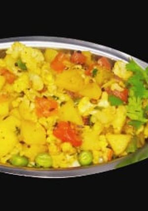 A picture of Cauliflower and veg stir-fry.
