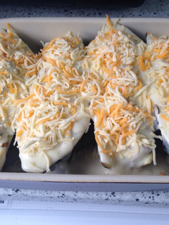 Una foto de Berenjenas rellenas de pollo y champiñones