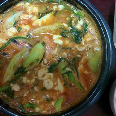 A picture of Sundubu Jjigae (Spicy Tofu Stew).