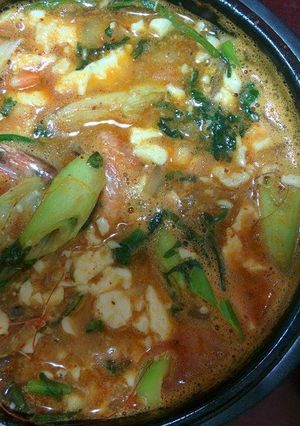 A picture of Sundubu Jjigae (Spicy Tofu Stew).