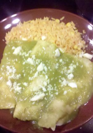 A picture of green authentic enchiladas.