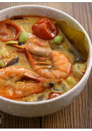A picture of Tom Yum Goong (Thai Hot and Sour Shrimp Soup).