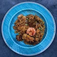 Una foto de Paella a la leña