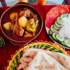 A picture of Aloo Matar Gosht.
