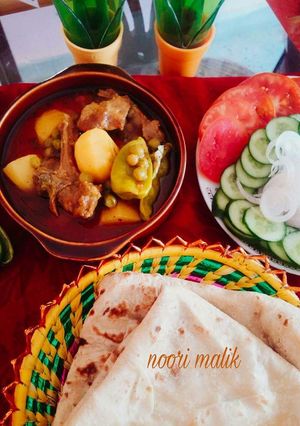 A picture of Aloo Matar Gosht.