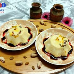 A picture of Bhapa doi (steamed yoghurt pudding).