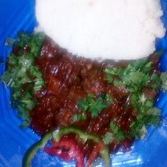 Stewed liver served with ugali A picture of Stewed liver served with ugali.