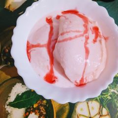 A picture of Vanilla icecream with roohafza.
