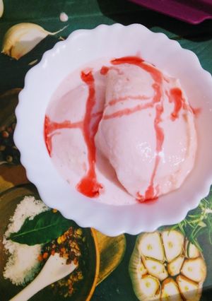 A picture of Vanilla icecream with roohafza.
