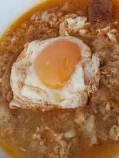 Una foto de Sopa de ajo con huevo escalfado