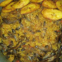 A picture of Local jollof rice and fried plantain.
