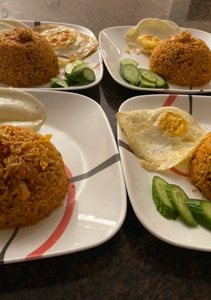 A picture of Indonesian style red fried rice (hot).
