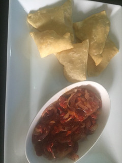 A picture of Al- puri with onion sauce.
