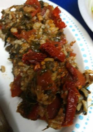 A picture of Spinach, Rice and Tomatoes.