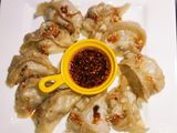 Dumplings or Momos Served With Chilli Oil