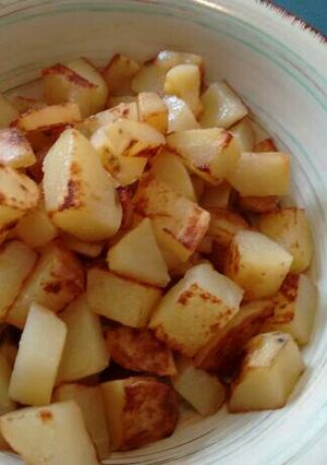 Una foto de Patatas fritas con ajo.ॐ