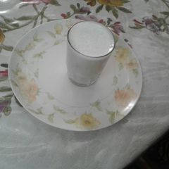 A picture of Salty spicy lassi with sabja seeds.