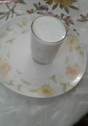 A picture of Salty spicy lassi with sabja seeds.