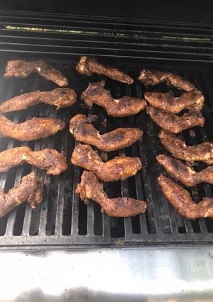 A picture of Spicy dry jerk rubbed smoked chicken wings.