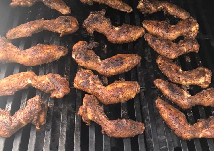 Spicy dry jerk rubbed smoked chicken wings