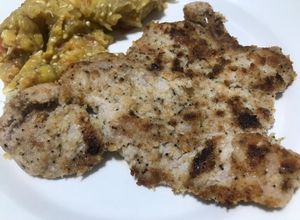 Una foto de Milanesa de cerdo parmesana