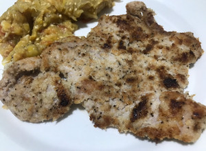 Una foto de Milanesa de cerdo parmesana