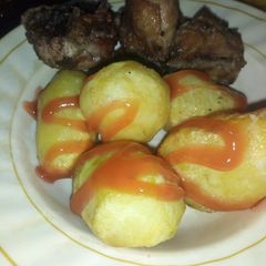 Deep fried potatoes n chicken A picture of Deep fried potatoes n chicken.