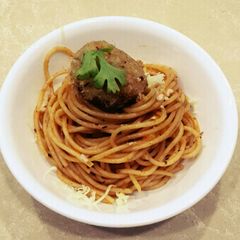 A picture of Spaghetti with Cheese and Corn Balls.
