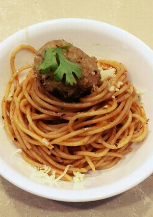 A picture of Spaghetti with Cheese and Corn Balls.