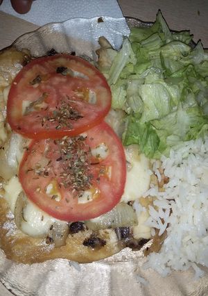 Una foto de Filet de sabalos a la napolitana