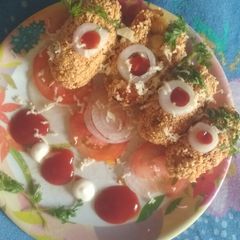 A picture of Papad potato stuffing cheese roll.