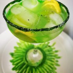 A picture of Raw mango and kiwi juice.