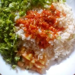 A picture of White rice and stew.