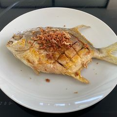 A picture of Fried Turmeric Golden Pomfret.