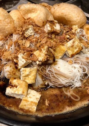 A picture of Ketoprak - Vermicelli tofu salad with peanut dressing.