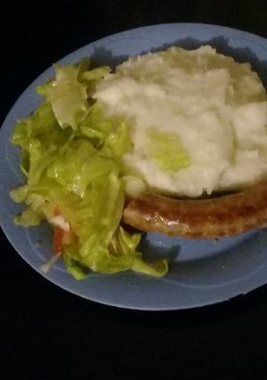 A picture of Pap with wors and lettuce.