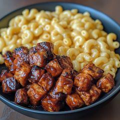 A picture of Honey BBQ chicken and Mac n Cheese.