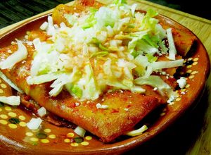 Una foto de Enchiladas rojas