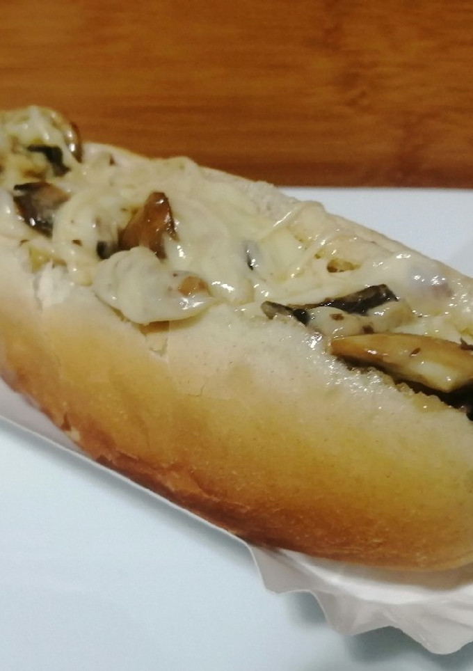 Una foto de As de queso champiñón y carne 🌭