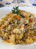 Risotto con Cozze, Vongole, Calamari e Pomodorini Freschi