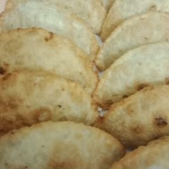 Gujiya (coconut stuffing) A picture of Gujiya (coconut stuffing).